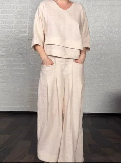 💎 Dwuczęściowy komplet z bawełny i lnu z nieregularnym dołem – bluzka z dekoltem w serek + spodnie z szerokimi nogawkami, przewiewny i naturalnie elegancki 🍂👚