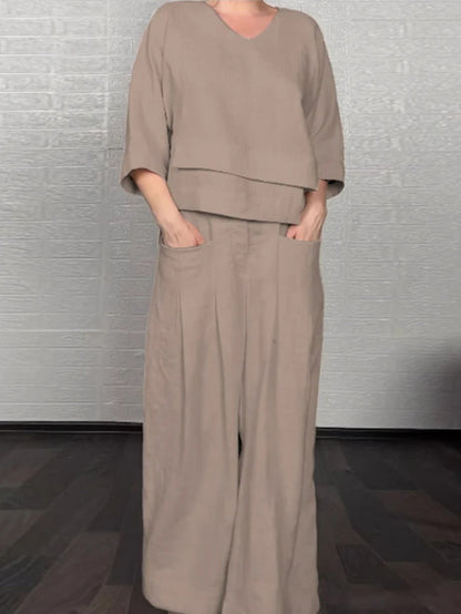 💎 Dwuczęściowy komplet z bawełny i lnu z nieregularnym dołem – bluzka z dekoltem w serek + spodnie z szerokimi nogawkami, przewiewny i naturalnie elegancki 🍂👚