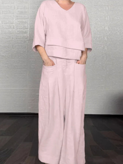 💎 Dwuczęściowy komplet z bawełny i lnu z nieregularnym dołem – bluzka z dekoltem w serek + spodnie z szerokimi nogawkami, przewiewny i naturalnie elegancki 🍂👚