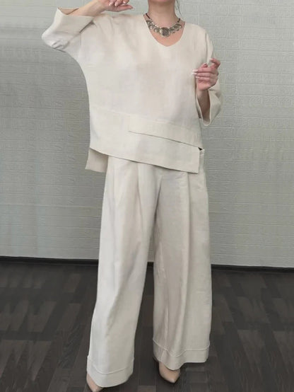 💎 Dwuczęściowy komplet z bawełny i lnu z nieregularnym dołem – bluzka z dekoltem w serek + spodnie z szerokimi nogawkami, przewiewny i naturalnie elegancki 🍂👚